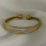 Dual-Tone Gold & Silver Textured Cuff Bracelet with Ball Closure
