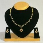 Gold Plated Leaf & Diamond CZ Necklace Set with Ruby Stone Pendant and Chandbali Earrings