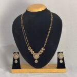 Elegant Gold Plated Floral Pendant Necklace Set with American Diamond & Green CZ Stones