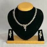 Elegant Silver Plated Leaf Design Necklace Set with American Diamond & Pearl Drops